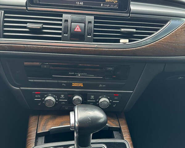 Черный Ауди А6, объемом двигателя 1.98 л и пробегом 144 тыс. км за 14499 $, фото 11 на Automoto.ua