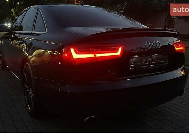 Черный Ауди А6, объемом двигателя 2 л и пробегом 165 тыс. км за 14600 $, фото 17 на Automoto.ua