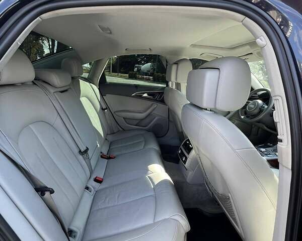 Черный Ауди А6, объемом двигателя 1.98 л и пробегом 210 тыс. км за 12800 $, фото 6 на Automoto.ua