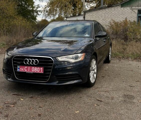 Черный Ауди А6, объемом двигателя 2 л и пробегом 210 тыс. км за 13300 $, фото 1 на Automoto.ua
