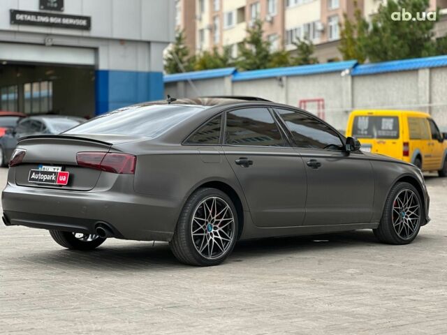 Чорний Ауді А6, об'ємом двигуна 2 л та пробігом 225 тис. км за 15940 $, фото 4 на Automoto.ua