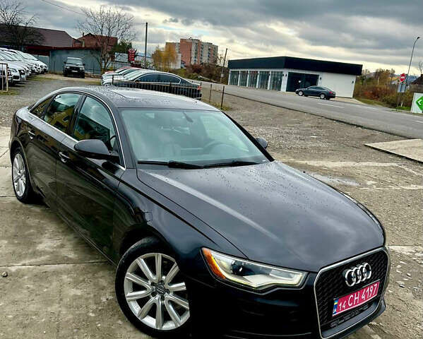 Чорний Ауді А6, об'ємом двигуна 2 л та пробігом 235 тис. км за 12600 $, фото 1 на Automoto.ua