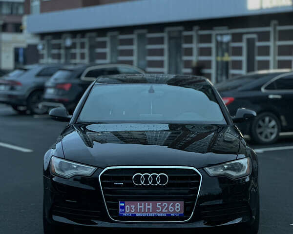 Черный Ауди А6, объемом двигателя 2 л и пробегом 218 тыс. км за 12250 $, фото 1 на Automoto.ua