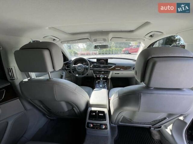 Черный Ауди А6, объемом двигателя 1.98 л и пробегом 210 тыс. км за 12800 $, фото 10 на Automoto.ua