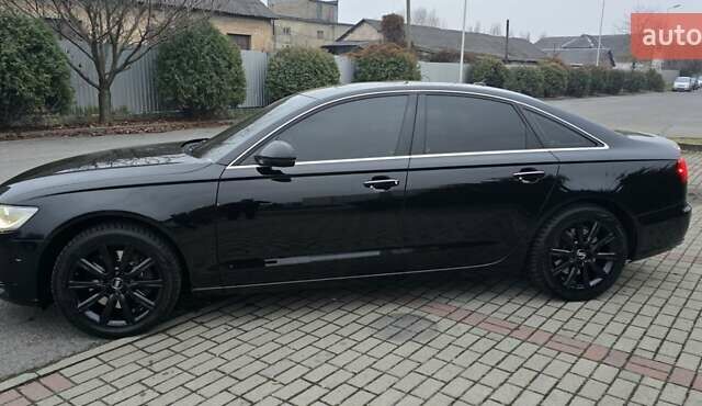 Ауді А6 2014 у Ужгороді на Automoto.ua Чорний Ауді А6, об'ємом двигуна 1.98 л та пробігом 272 тис. км за 13200 $, фото 5 на Automoto.ua
