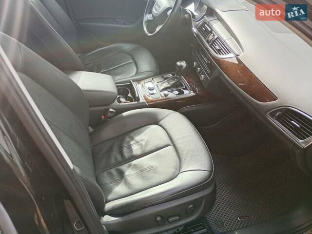 Черный Ауди А6, объемом двигателя 1.97 л и пробегом 218 тыс. км за 16500 $, фото 1 на Automoto.ua