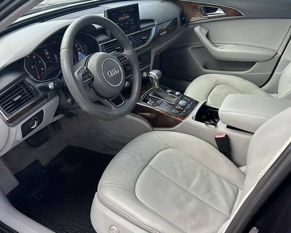 Черный Ауди А6, объемом двигателя 1.98 л и пробегом 210 тыс. км за 12800 $, фото 5 на Automoto.ua