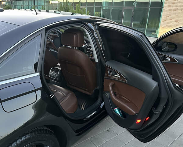 Черный Ауди А6, объемом двигателя 2 л и пробегом 275 тыс. км за 15150 $, фото 42 на Automoto.ua