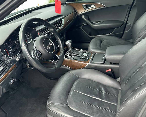 Черный Ауди А6, объемом двигателя 1.98 л и пробегом 144 тыс. км за 14499 $, фото 5 на Automoto.ua