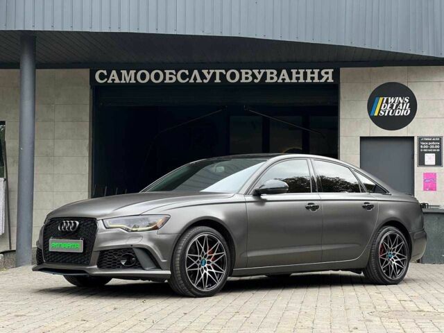 Черный Ауди А6, объемом двигателя 2 л и пробегом 220 тыс. км за 13900 $, фото 1 на Automoto.ua