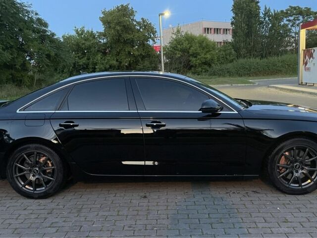 Черный Ауди А6, объемом двигателя 2 л и пробегом 165 тыс. км за 14600 $, фото 15 на Automoto.ua