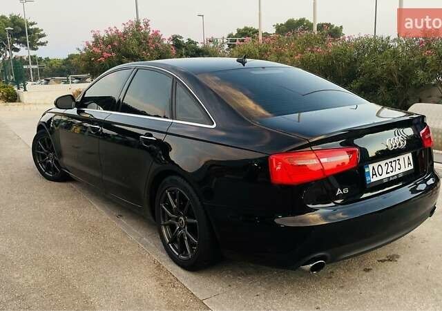 Черный Ауди А6, объемом двигателя 2 л и пробегом 165 тыс. км за 14600 $, фото 2 на Automoto.ua