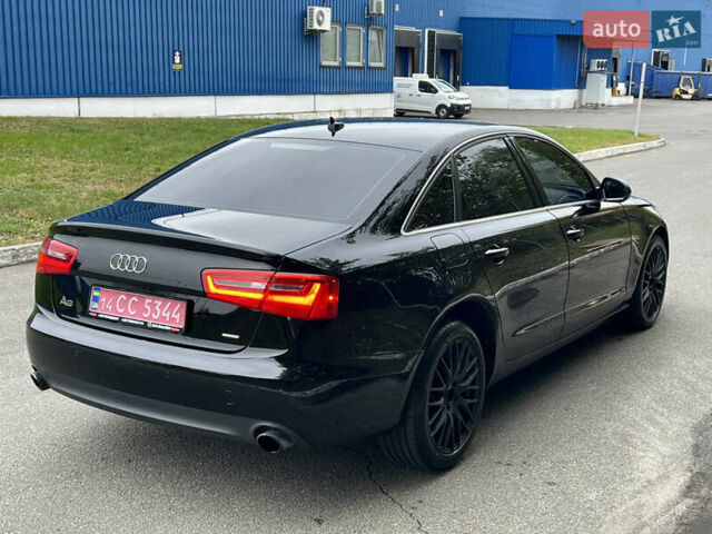 Черный Ауди А6, объемом двигателя 2 л и пробегом 181 тыс. км за 14700 $, фото 1 на Automoto.ua