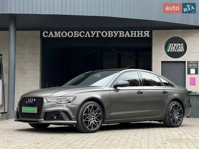Чорний Ауді А6, об'ємом двигуна 2 л та пробігом 195 тис. км за 13900 $, фото 1 на Automoto.ua