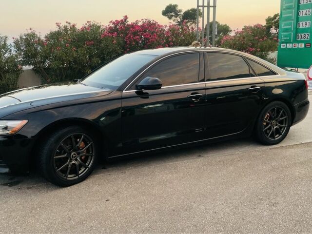 Черный Ауди А6, объемом двигателя 2 л и пробегом 165 тыс. км за 14600 $, фото 2 на Automoto.ua