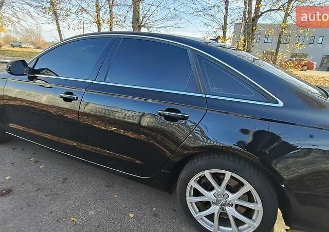 Чорний Ауді А6, об'ємом двигуна 2 л та пробігом 201 тис. км за 16700 $, фото 4 на Automoto.ua
