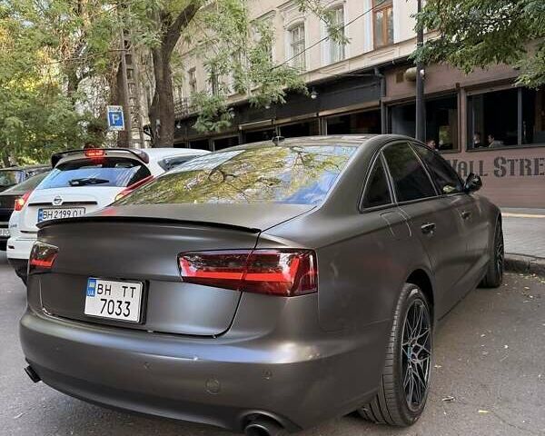 Черный Ауди А6, объемом двигателя 2 л и пробегом 225 тыс. км за 15500 $, фото 1 на Automoto.ua
