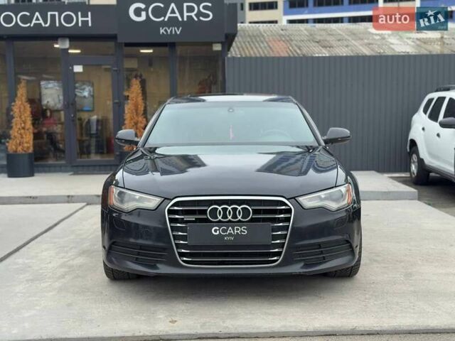 Чорний Ауді А6, об'ємом двигуна 2 л та пробігом 242 тис. км за 12900 $, фото 1 на Automoto.ua