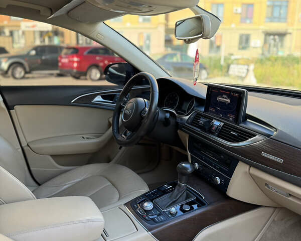 Черный Ауди А6, объемом двигателя 1.98 л и пробегом 232 тыс. км за 12500 $, фото 13 на Automoto.ua