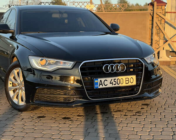 Черный Ауди А6, объемом двигателя 2 л и пробегом 197 тыс. км за 16200 $, фото 1 на Automoto.ua