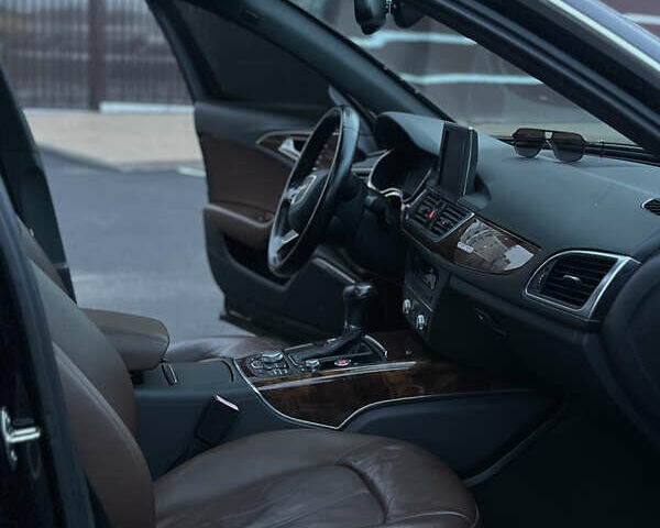 Черный Ауди А6, объемом двигателя 2 л и пробегом 218 тыс. км за 12250 $, фото 7 на Automoto.ua