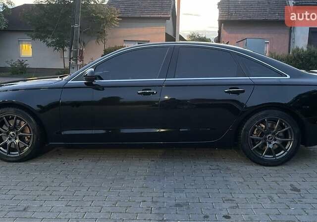 Черный Ауди А6, объемом двигателя 2 л и пробегом 165 тыс. км за 14600 $, фото 10 на Automoto.ua
