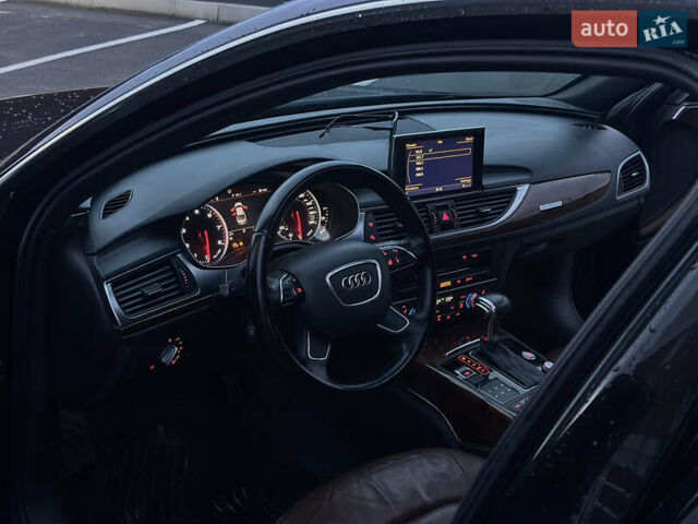Черный Ауди А6, объемом двигателя 2 л и пробегом 218 тыс. км за 12250 $, фото 16 на Automoto.ua