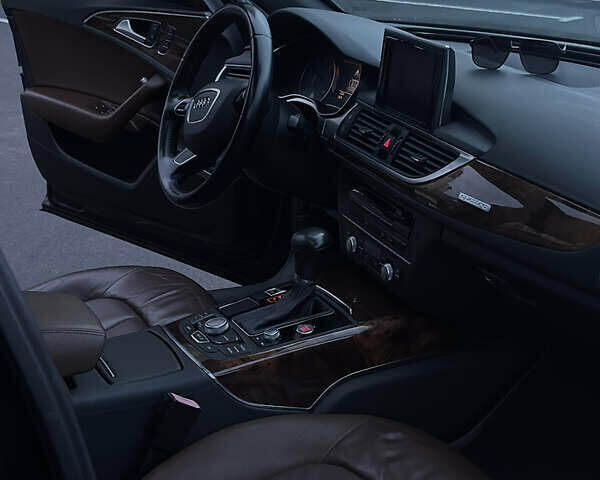 Черный Ауди А6, объемом двигателя 2 л и пробегом 218 тыс. км за 12250 $, фото 8 на Automoto.ua