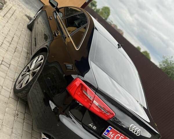 Черный Ауди А6, объемом двигателя 2 л и пробегом 150 тыс. км за 13000 $, фото 3 на Automoto.ua