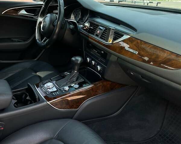 Чорний Ауді А6, об'ємом двигуна 1.98 л та пробігом 179 тис. км за 16000 $, фото 17 на Automoto.ua