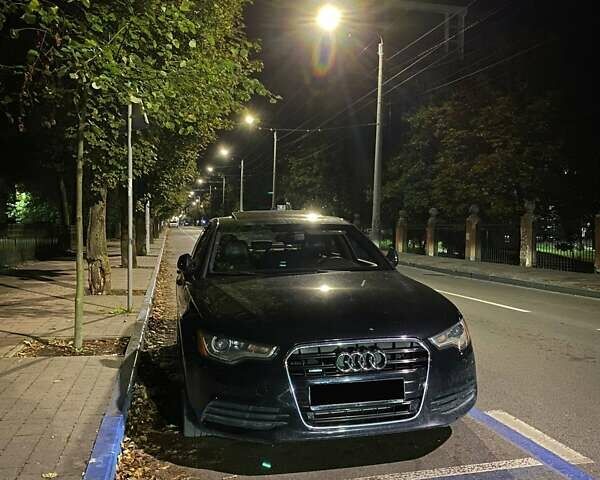 Черный Ауди А6, объемом двигателя 2 л и пробегом 273 тыс. км за 13000 $, фото 1 на Automoto.ua