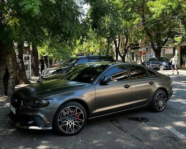 Черный Ауди А6, объемом двигателя 2 л и пробегом 225 тыс. км за 15500 $, фото 3 на Automoto.ua