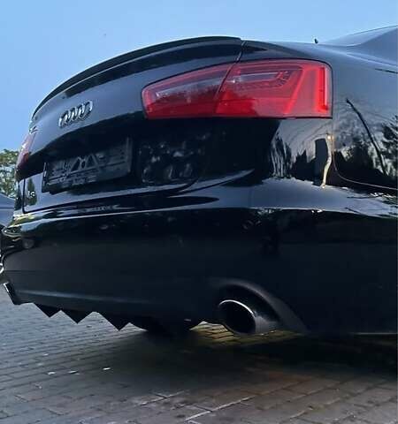 Черный Ауди А6, объемом двигателя 2 л и пробегом 165 тыс. км за 14600 $, фото 12 на Automoto.ua