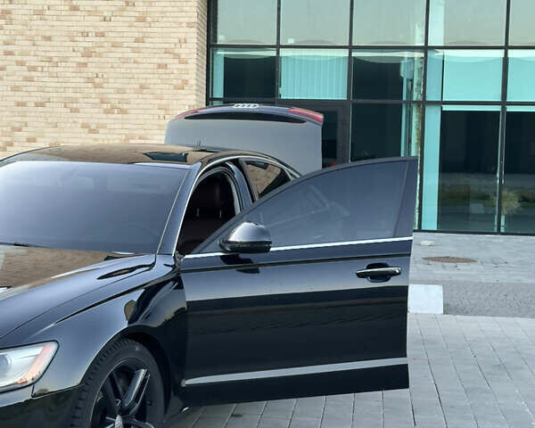 Черный Ауди А6, объемом двигателя 2 л и пробегом 275 тыс. км за 15150 $, фото 4 на Automoto.ua