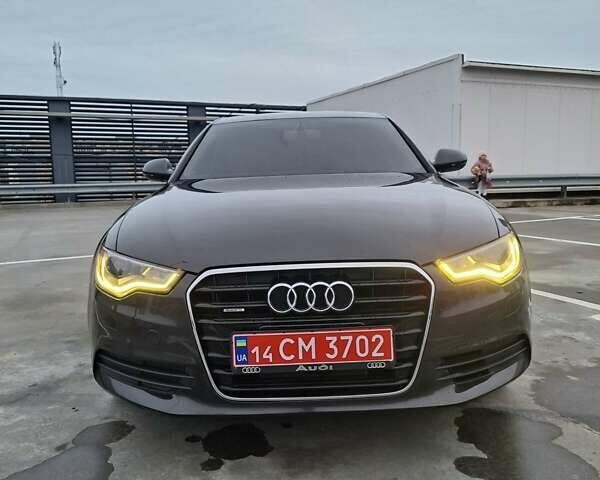 Черный Ауди А6, объемом двигателя 2 л и пробегом 185 тыс. км за 12600 $, фото 1 на Automoto.ua