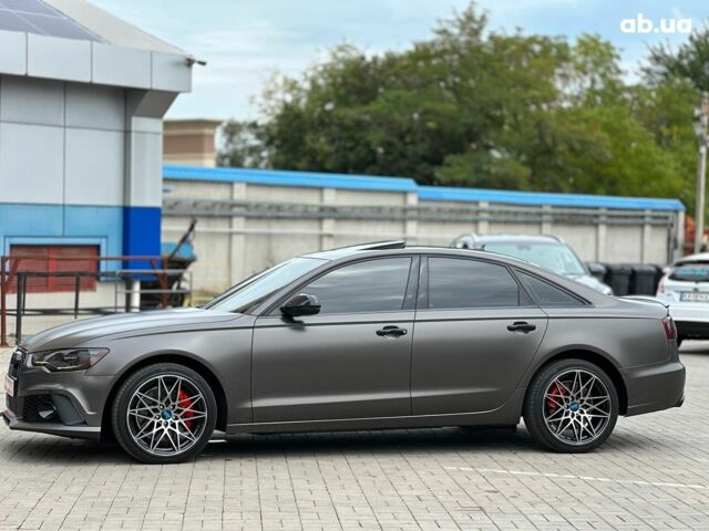 Чорний Ауді А6, об'ємом двигуна 2 л та пробігом 225 тис. км за 15940 $, фото 7 на Automoto.ua