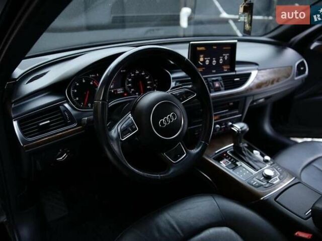 Черный Ауди А6, объемом двигателя 2 л и пробегом 165 тыс. км за 14600 $, фото 6 на Automoto.ua