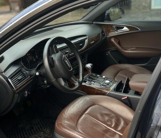 Черный Ауди А6, объемом двигателя 2 л и пробегом 210 тыс. км за 13300 $, фото 2 на Automoto.ua