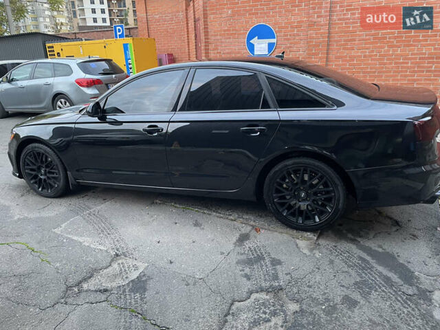 Черный Ауди А6, объемом двигателя 1.98 л и пробегом 154 тыс. км за 17600 $, фото 4 на Automoto.ua