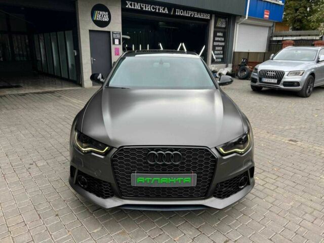 Черный Ауди А6, объемом двигателя 2 л и пробегом 220 тыс. км за 13900 $, фото 2 на Automoto.ua