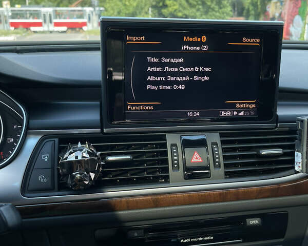 Черный Ауди А6, объемом двигателя 1.98 л и пробегом 170 тыс. км за 15500 $, фото 4 на Automoto.ua