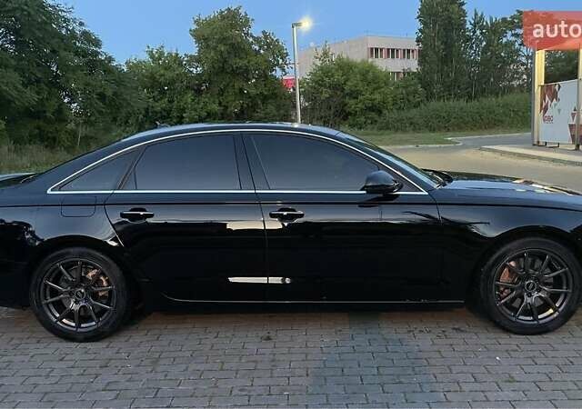 Черный Ауди А6, объемом двигателя 2 л и пробегом 165 тыс. км за 14600 $, фото 14 на Automoto.ua