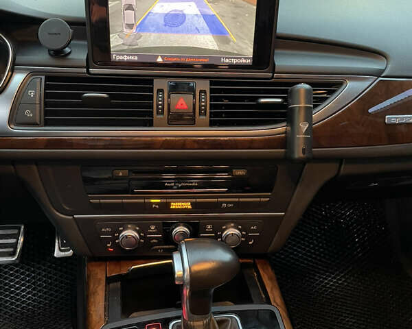 Черный Ауди А6, объемом двигателя 1.98 л и пробегом 154 тыс. км за 17600 $, фото 13 на Automoto.ua