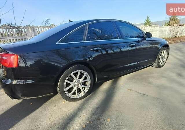 Чорний Ауді А6, об'ємом двигуна 2 л та пробігом 201 тис. км за 16700 $, фото 1 на Automoto.ua