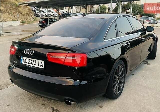 Черный Ауди А6, объемом двигателя 2 л и пробегом 165 тыс. км за 14600 $, фото 4 на Automoto.ua