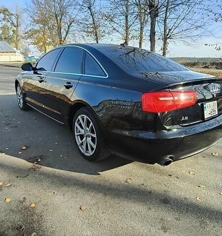 Чорний Ауді А6, об'ємом двигуна 2 л та пробігом 201 тис. км за 16700 $, фото 5 на Automoto.ua