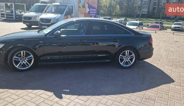 Черный Ауди А6, объемом двигателя 1.97 л и пробегом 244 тыс. км за 17300 $, фото 1 на Automoto.ua