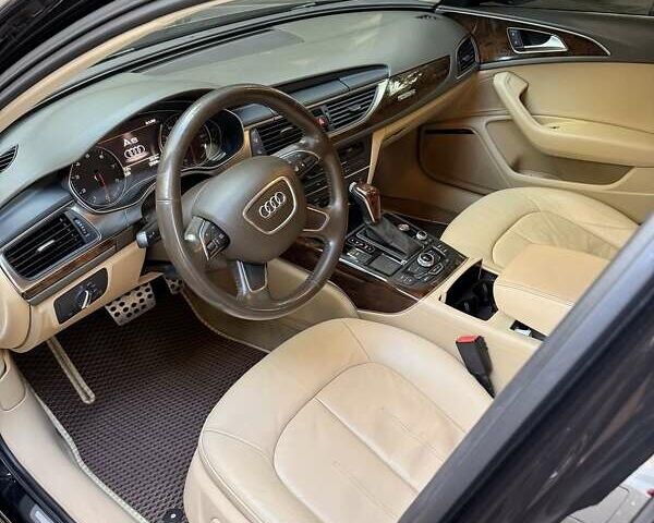 Черный Ауди А6, объемом двигателя 2 л и пробегом 225 тыс. км за 15500 $, фото 4 на Automoto.ua