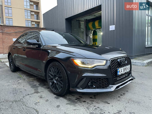 Черный Ауди А6, объемом двигателя 1.98 л и пробегом 154 тыс. км за 17600 $, фото 10 на Automoto.ua