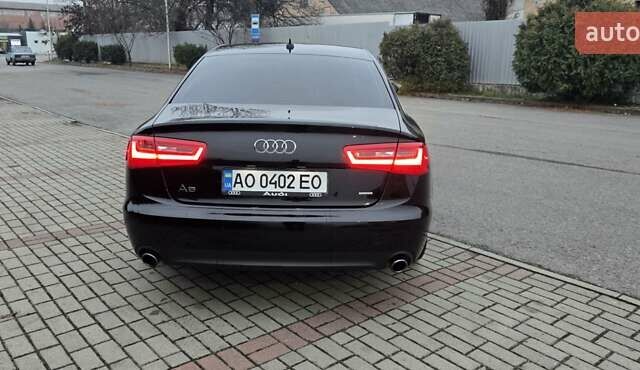 Ауді А6 2014 у Ужгороді на Automoto.ua Чорний Ауді А6, об'ємом двигуна 1.98 л та пробігом 272 тис. км за 13200 $, фото 4 на Automoto.ua